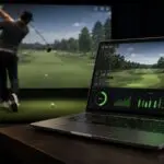 Gaming laptop showing golf simulator software data next to a home simulator screen