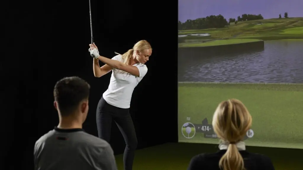 TrackMan simulator bays inside Bogey's Indoor Golf in Grove City, Ohio