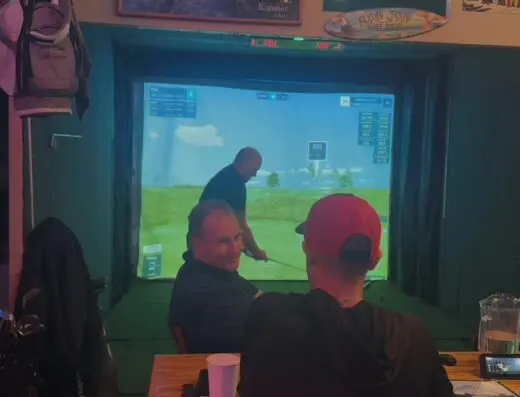 Sim screen with player at CaddyShack in Coeur d'Alene, ID