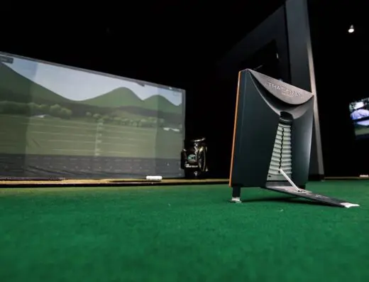 Sim bay with screen at Club Speed Golf Performance Studio in Winterville, NC