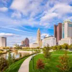 Downtown Columbus, Ohio skyline and Scioto Mile riverfront on a clear fall day