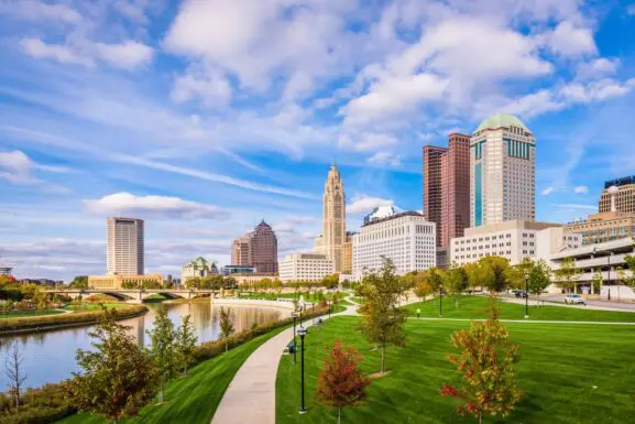 Downtown Columbus, Ohio skyline and Scioto Mile riverfront on a clear fall day