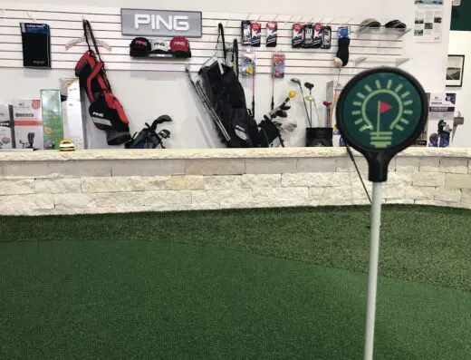Golfer at a bay at GolfSmart Indoor Golf in Houston, TX