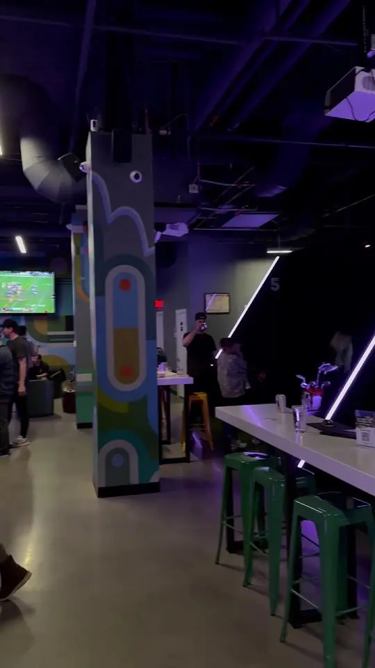 Uneekor simulator bays and bar at Good Time Golf, Assembly Row, Somerville