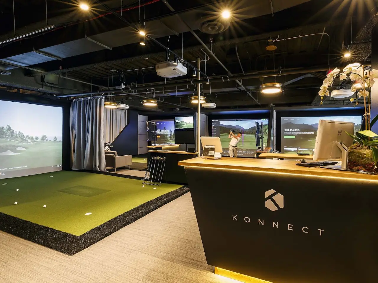 Trackman simulator bays at Konnectgolf indoor golf club on Fifth Avenue, New York