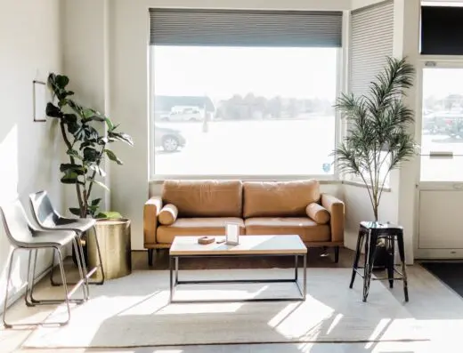 Lounge with sofas and TV at One Under Golf Club in Orange City, IA