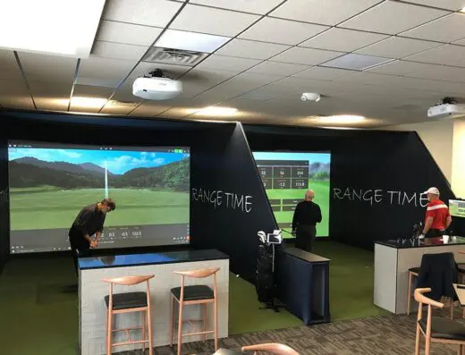 Sim bay with TVs at Range Time Golf in Sturtevant, WI