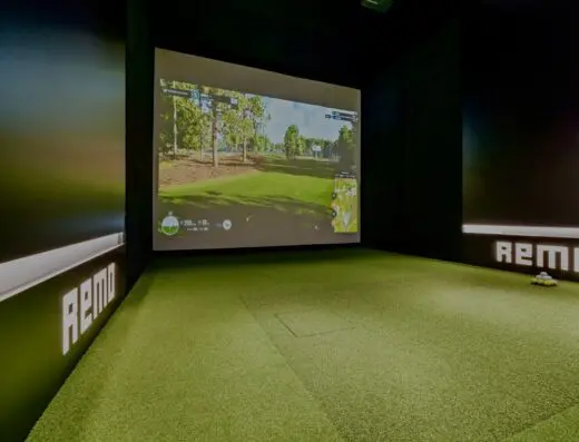 Sim bay with Remo branding at Remo Golf Point Venture in Point Venture, TX