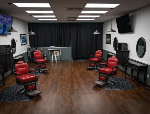 Inside Shanks Barbershop - indoor golf in Whitsett, NC