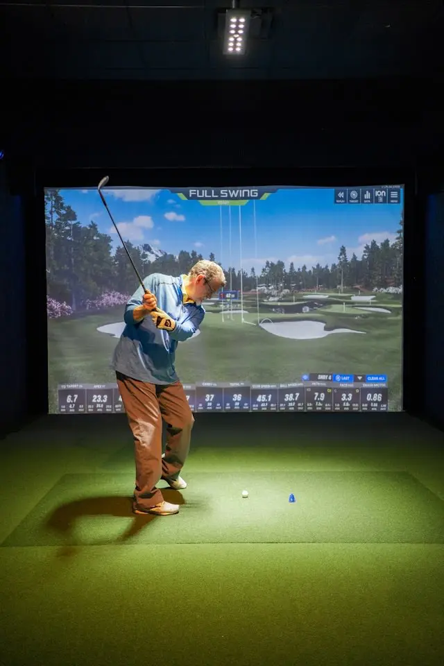Private 24-hour golf simulator bay at The Back Nine Golf in Omaha, Nebraska