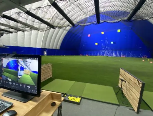 Simulator screen station inside the dome, mini golf outside at The Golf Dome in Chagrin Falls, OH
