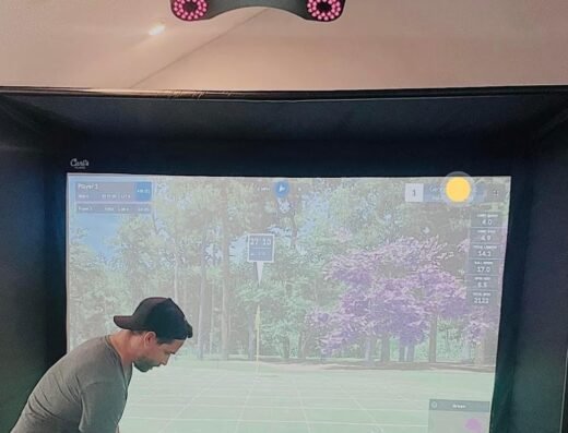 Golf simulator bay at Quail Run Leisure Center - Community Pool in Dayton