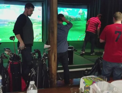 Guests in the simulator bays at Golf Zone in Avon, OH
