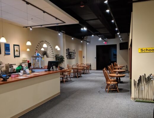 Lounge and front desk at Play-a-Round Golf Ardmore in Ardmore, PA